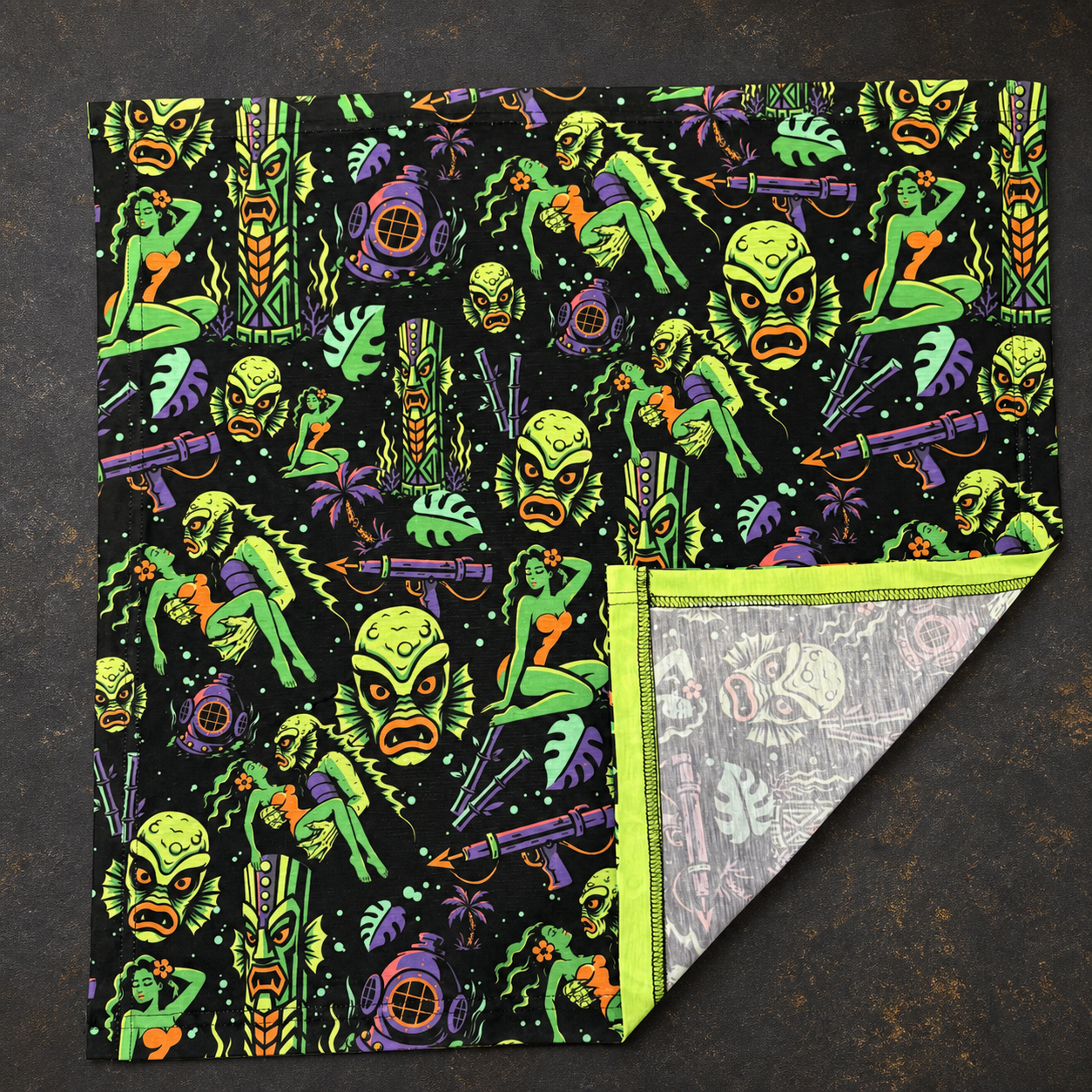 Gill-Man From the Deep 22 by 22 inch UV-reactive bandana on vintage slate