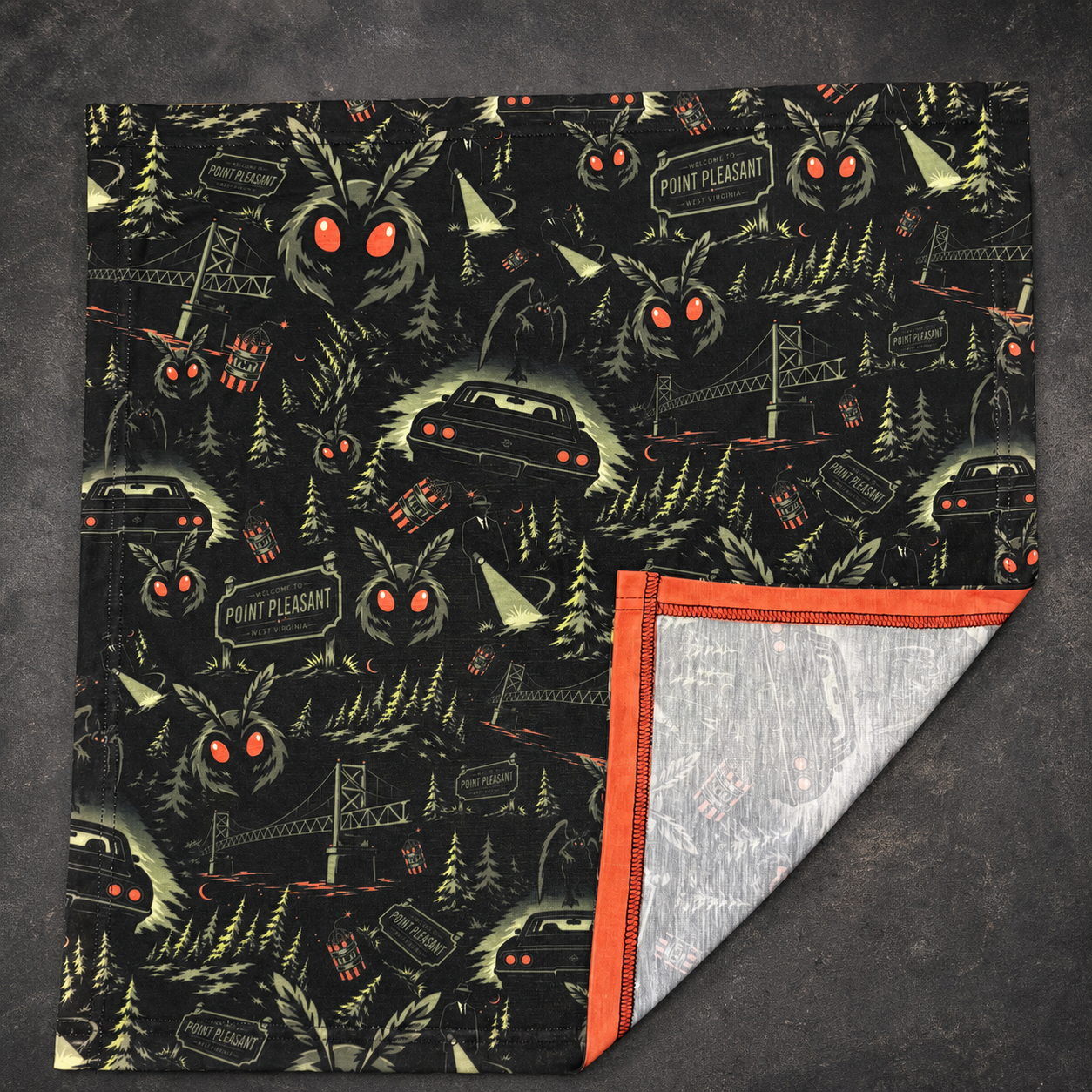 Mothman 22 by 22 inch UV-reactive bandana on vintage slate